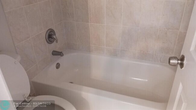 Building Photo - 2421 NW 56th Ave