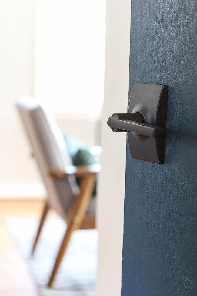 Modern lever style door hardware - 905 Culpepper Ln