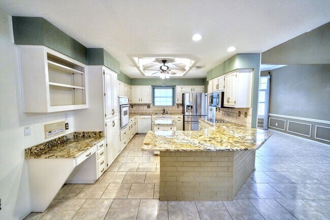 Building Photo - Executive Home in Greenshire with Luxurious Updates and Spacious Outdoor Living - Agent Commissio...