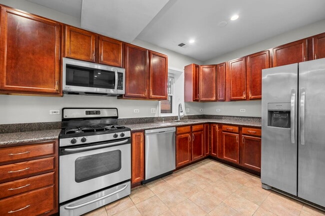 Building Photo - 9100 Lamon Ave
