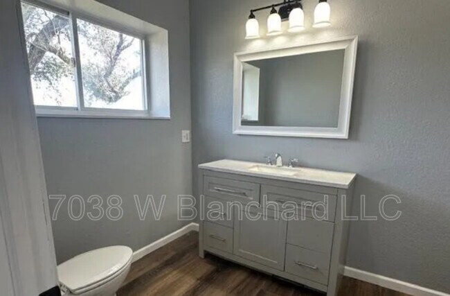 Building Photo - 7038 W Blanchard Rd