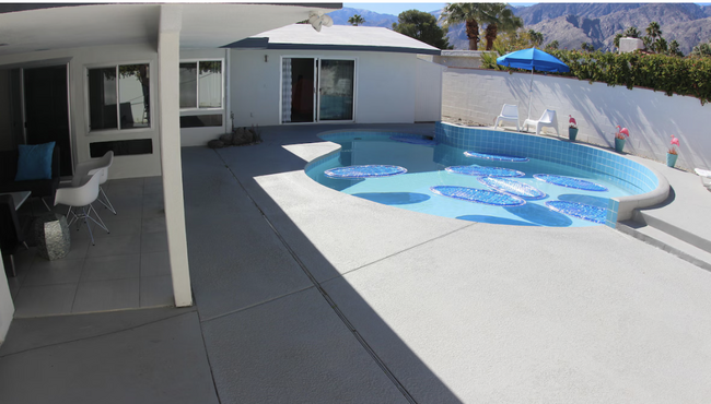 Great pool gets full sun, while covered space feels open but provides coverage - 2080 E McManus Dr