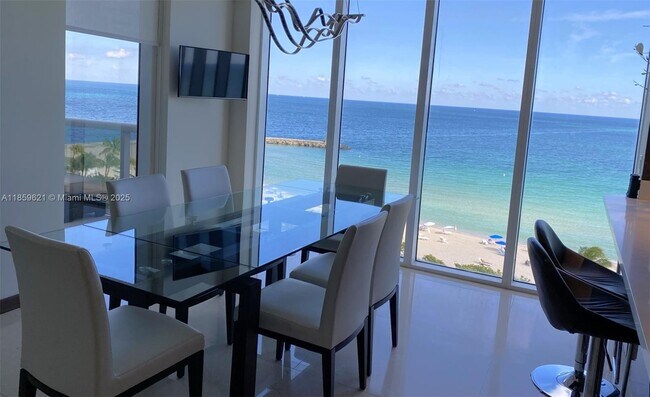 Building Photo - 10275 Collins Ave