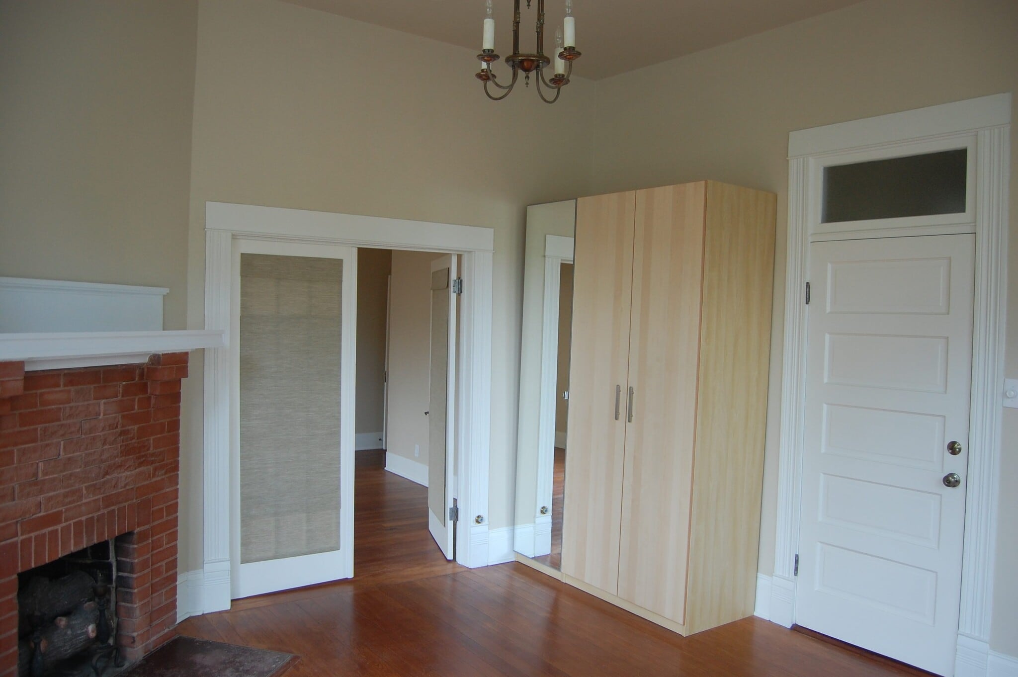 storage and dorr to the front entry of the house - 704 E Guenther St