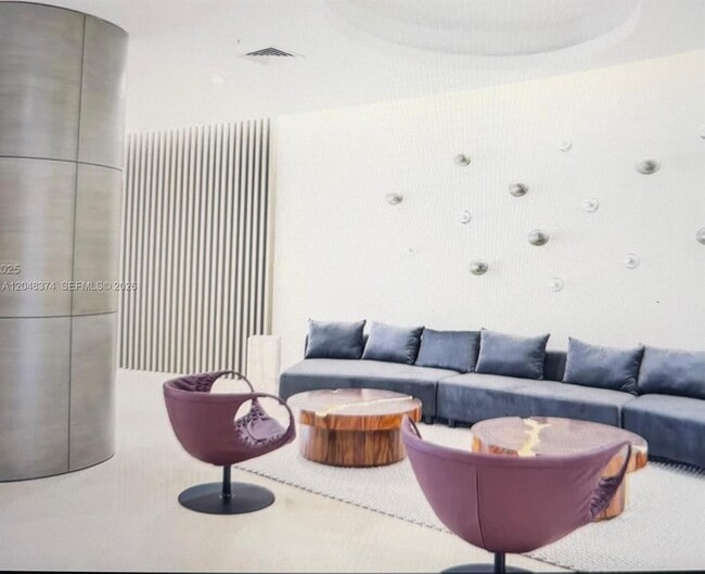 Building Photo - 10275 Collins Ave