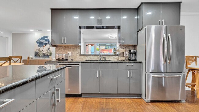 Building Photo - Luxurious FURNISHED 4BR/3BA Pool Home with...