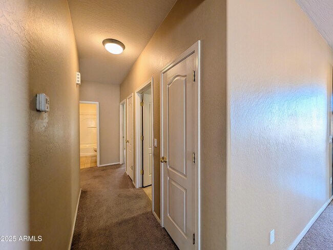 Building Photo - 16071 W Gelding Dr