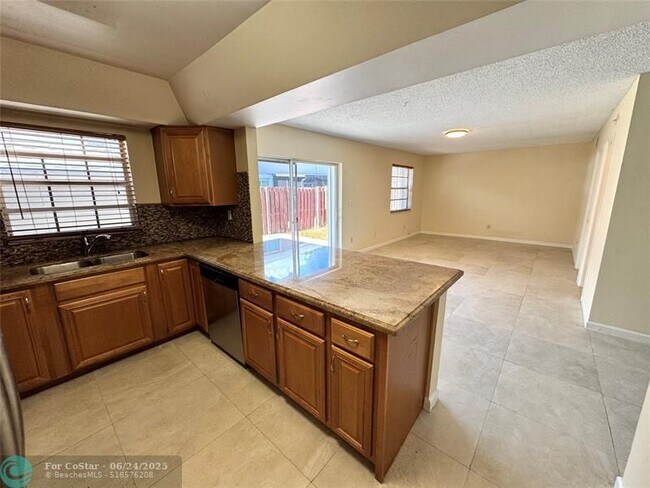 Building Photo - 12159 SW 52nd Ct