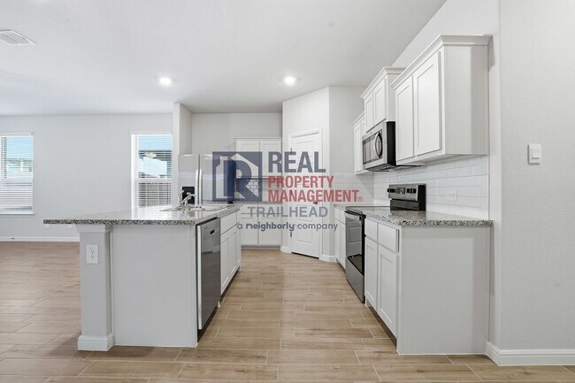 Building Photo - Spacious 5-Bedroom Home with Contemporary Living Spaces