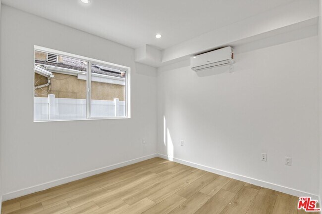 Building Photo - 10826 1/4 Hesby St