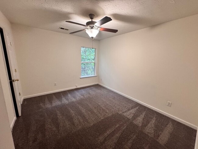 Building Photo - Peaceful 2-Story Townhome - Soothing sound...