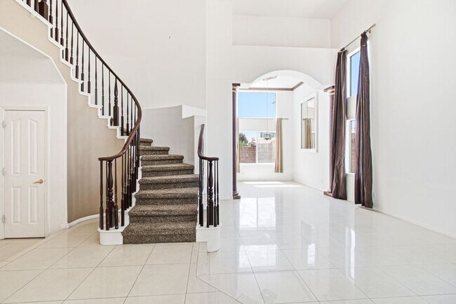 Building Photo - Spacious 4-Bedroom Home with Fireplace, 3-Car Garage & Great Backyard
