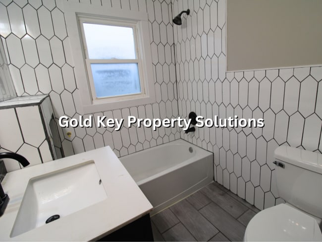 Building Photo - Attractive 2 BR 1 BA House with 2-Car Garage and Covered Porch (NO SECTION 8)