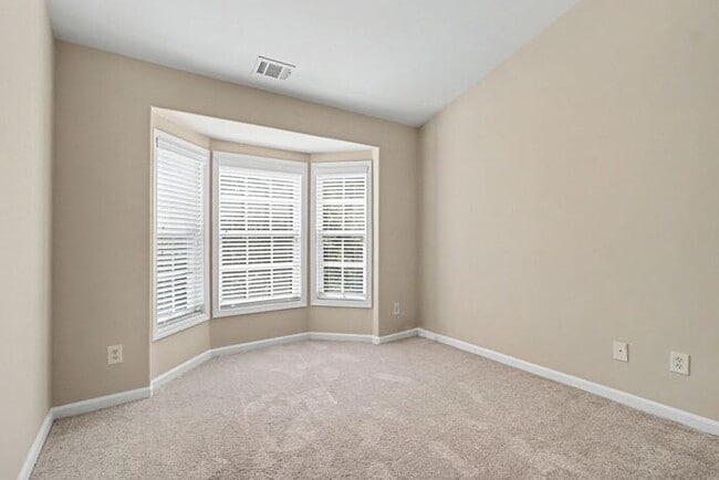 Building Photo - Exceptional 2BR/2.5BA End Unit Townhome in College Park!