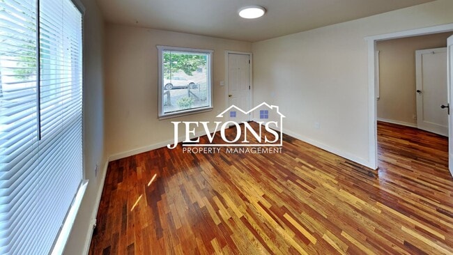 Building Photo - Step into your new residence, a charming s...
