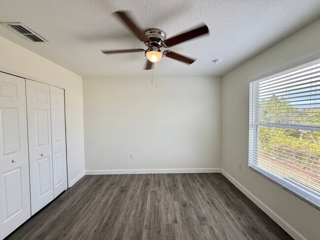 Building Photo - GORGEOUS, Large Completely Renovated Two-Story 4/2.5 PLUS LOFT in POINCIANA VILLAGES!