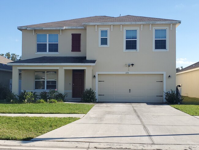 Building Photo - 6776 Wagon Trail St