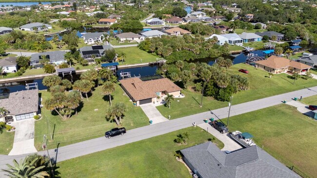 Building Photo - 3 BEDROOM • 2 BATHROOM • PRIVATE POOL • WATERFRONT • BOAT LIFT • ZERO DEPOSIT MOVE-IN AVAILABLE