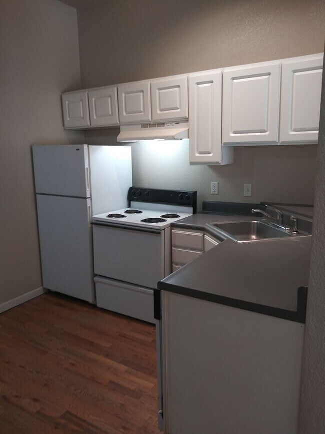 Building Photo - PRICED REDUCED!! Large windows and exposed...