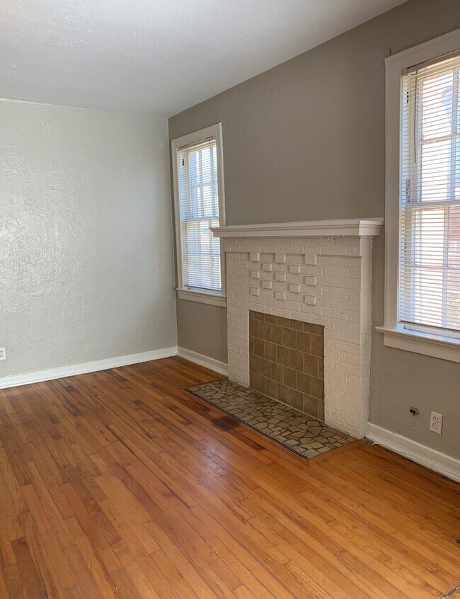 Building Photo - Charming Corner Lot Home with Huge Fenced Yard with Detached Garage