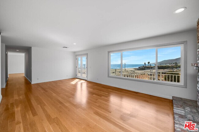 Building Photo - 6457 Surfside Way