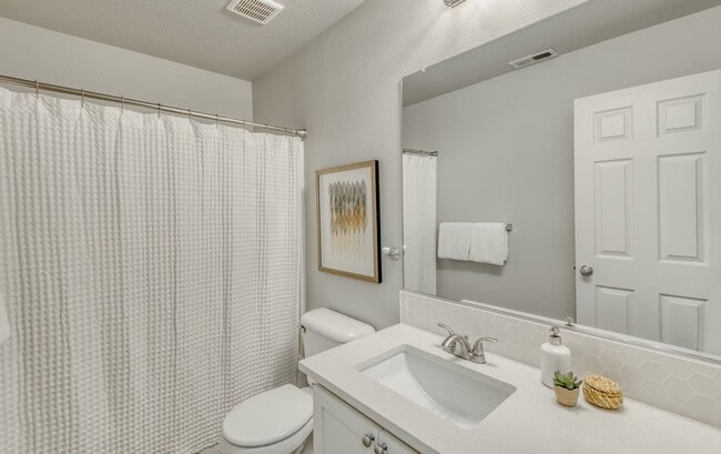 Building Photo - Beautiful Upscale End Unit Townhome with Lots of Updates! Walking Distance to Shopping & More!