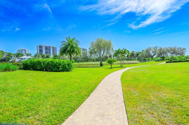 Building Photo - Live the Naples Lifestyle – Elegant 2BR/2B...