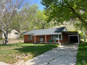 Building Photo - Beautiful home with garage, carport and fe...