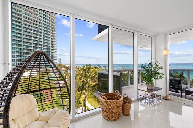 Building Photo - 10275 Collins Ave