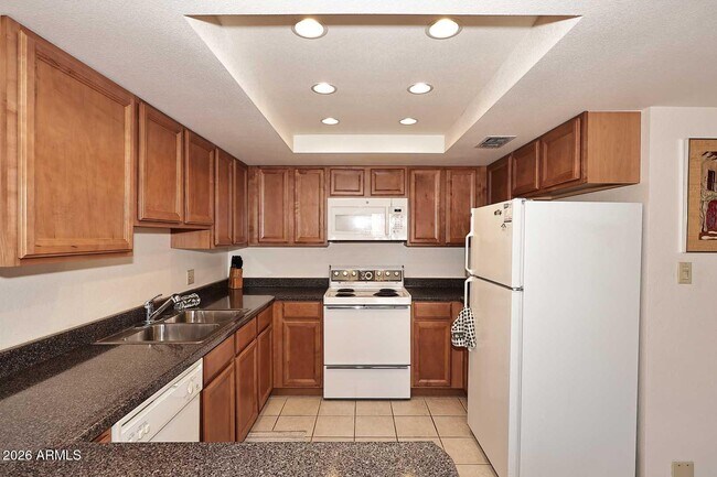 Building Photo - 7910 E Camelback Rd