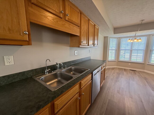 Building Photo - MOVE IN SPECIAL!! LARGE BEAUTIFUL 3 Bedroom 2.5 Bath Townhouse w/Finished Basement, Fenced in Yar...