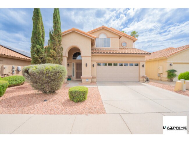 Building Photo - This charming and spacious 4/2.5 single family Phoenix house is perfect for comfortable living!