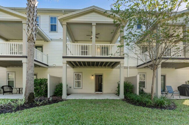 Building Photo - Introducing a captivating 3-story townhome...