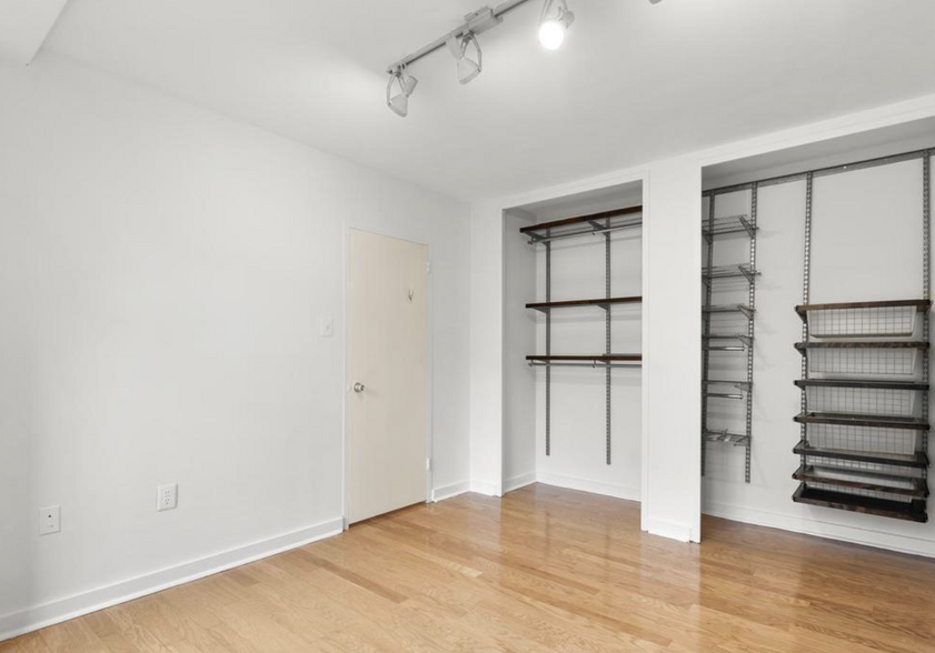 Double ELFA Closet – Spacious bedroom with custom ELFA closet for maximum storage. - 4000 Tunlaw Rd NW