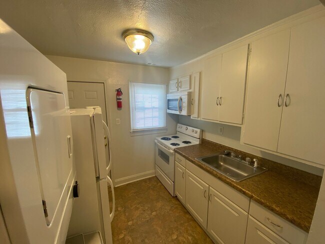 Building Photo - One of Durham's most walkable neighborhoods — and a yard to match.