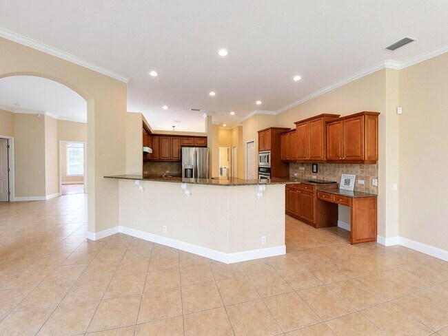 Building Photo - Now Available for Rent – 4/3 with flex room