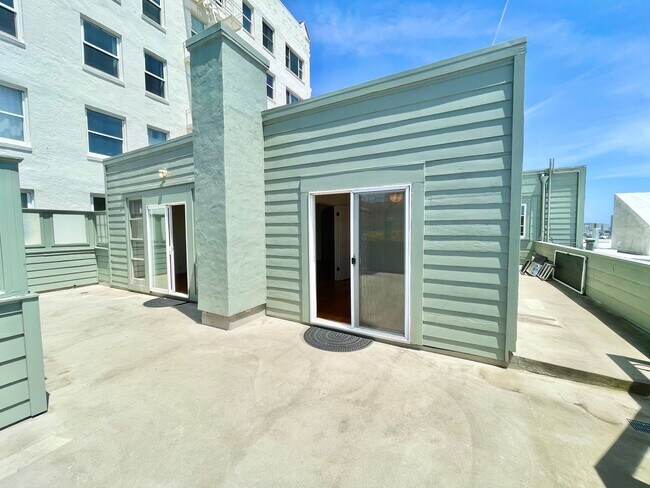 Building Photo - Bright and Airy 2 Bedroom Penthouse in the...