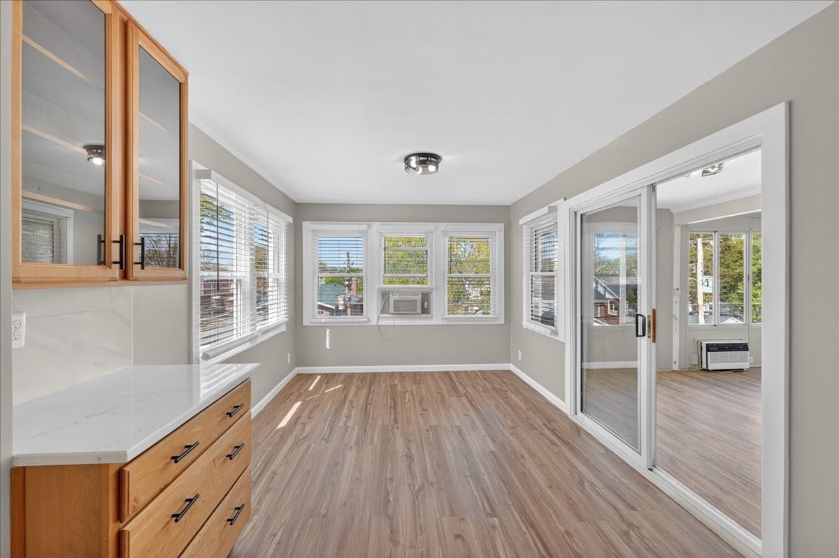 Versatile family room/flex space—ideal for home office, lounge, or additional dining - 5185 Goethe Ave