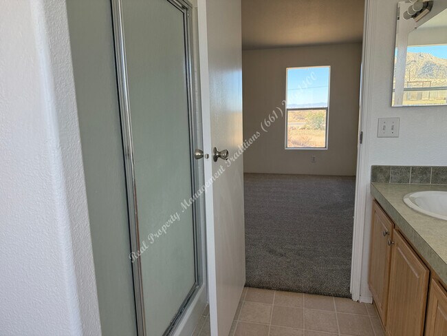 Building Photo - New Year Special! 50% Off First Month's Rent!