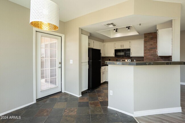 Building Photo - 9451 E Becker Ln