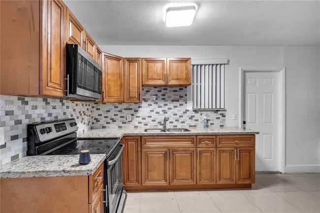 Building Photo - 1064 NW 103rd St