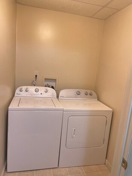separate laundry room - 105 W Main St