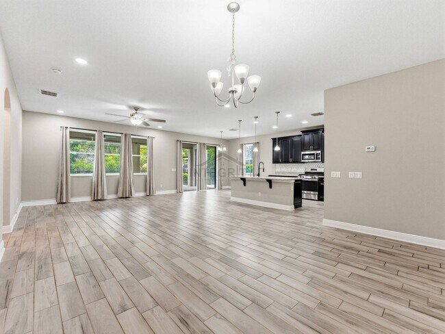 Building Photo - 8947 Garden Party Dr