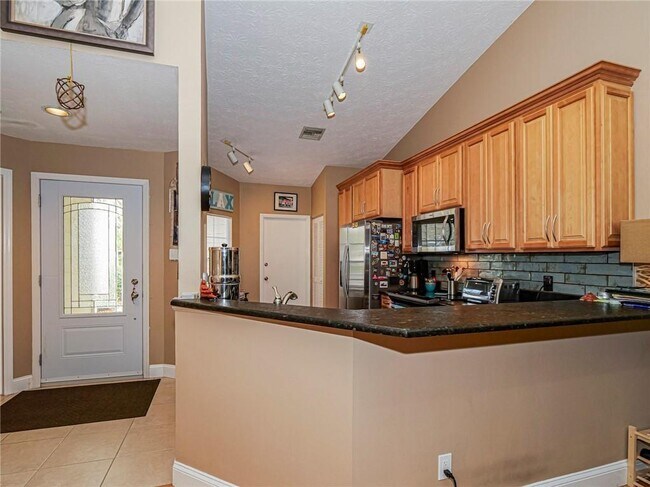 Building Photo - 1877 Sixty Oaks Ln