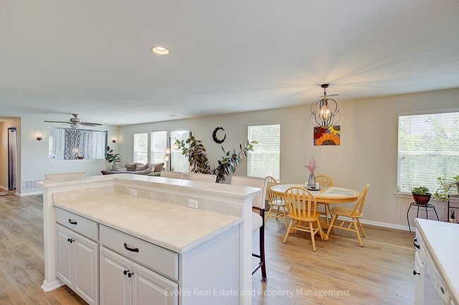 Building Photo - Evolve Real Estate: Beautiful Corner Townhome Available for Move-in on July 21st!