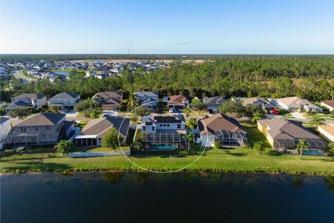 Building Photo - NORTH PORT - Rare Waterfront 4 bedroom pool home Annual/Unfurnished