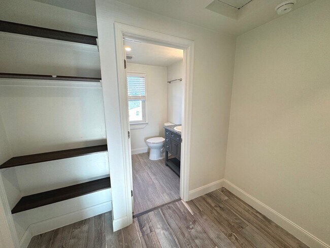 Building Photo - RENOVATED 3 bedroom end unit across the street from the Beach!