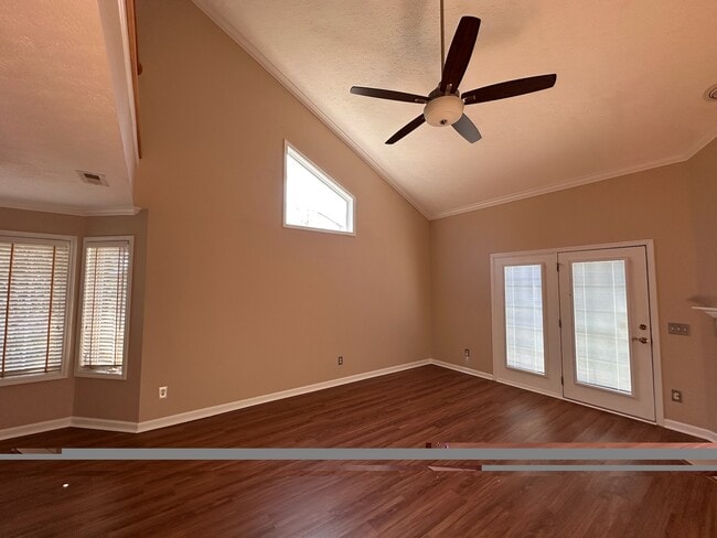 Living room with door leading to private patio - 2231 Whitney Ct