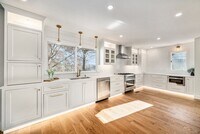 Building Photo - Renovated Lakefront 5 Bedroom Home with 2 Garages!