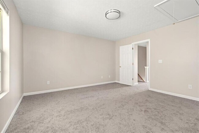 Building Photo - 5696 Windfall Ln